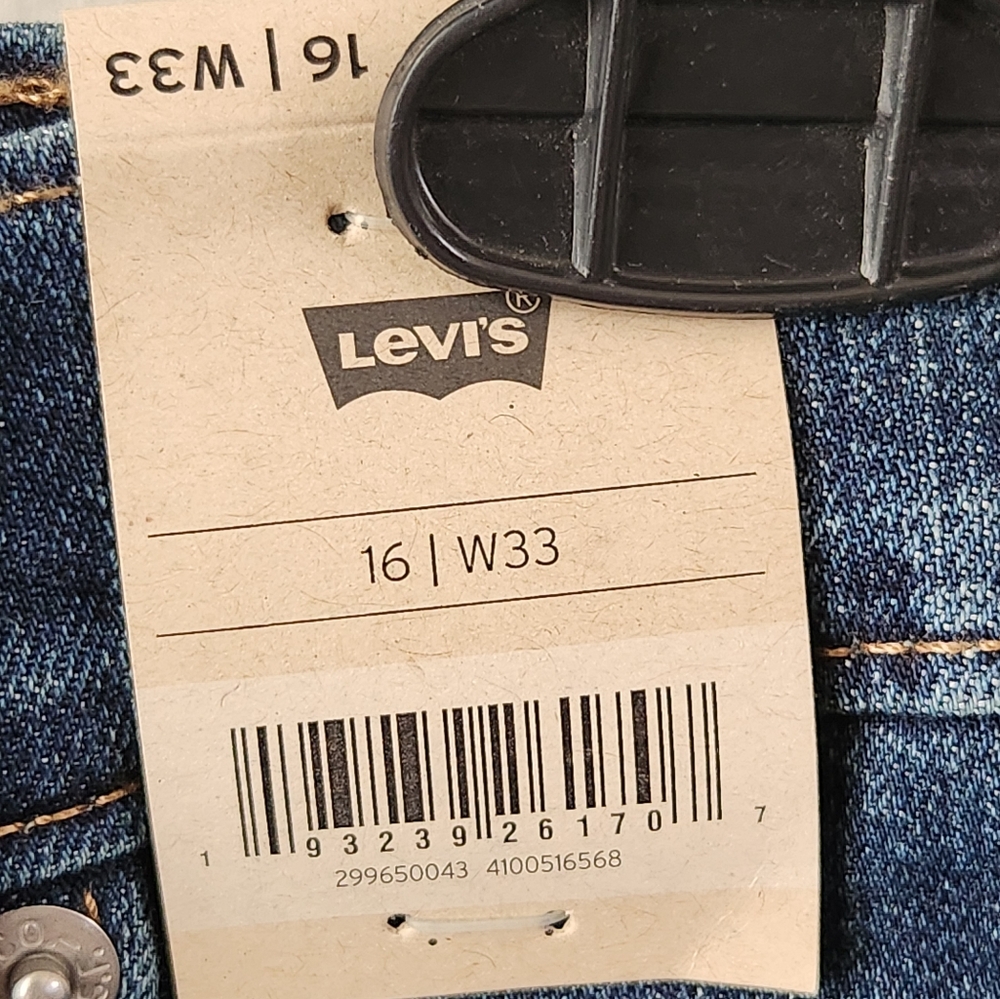 Levi's Jean Shorts Women's Mid Length Blue Medium Wash Denim 4" Size 33 NWT - Picture 8 of 10
